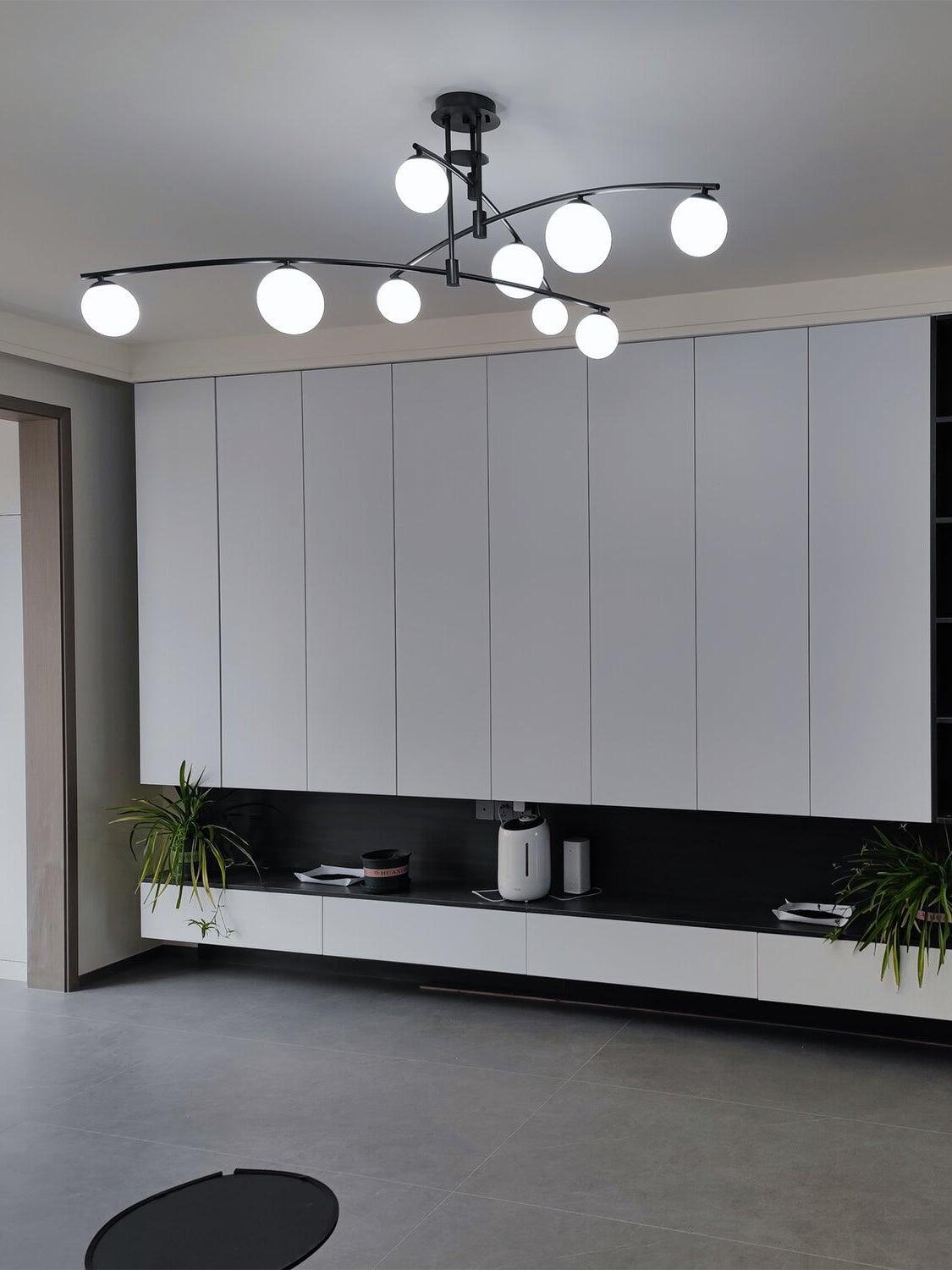 Black glass globe chandelier in a kitchen