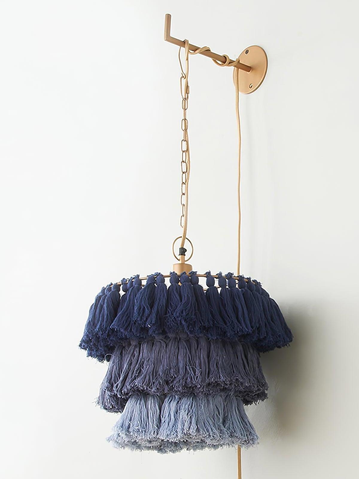 Blue tassel shade shown with wall bracket and chain