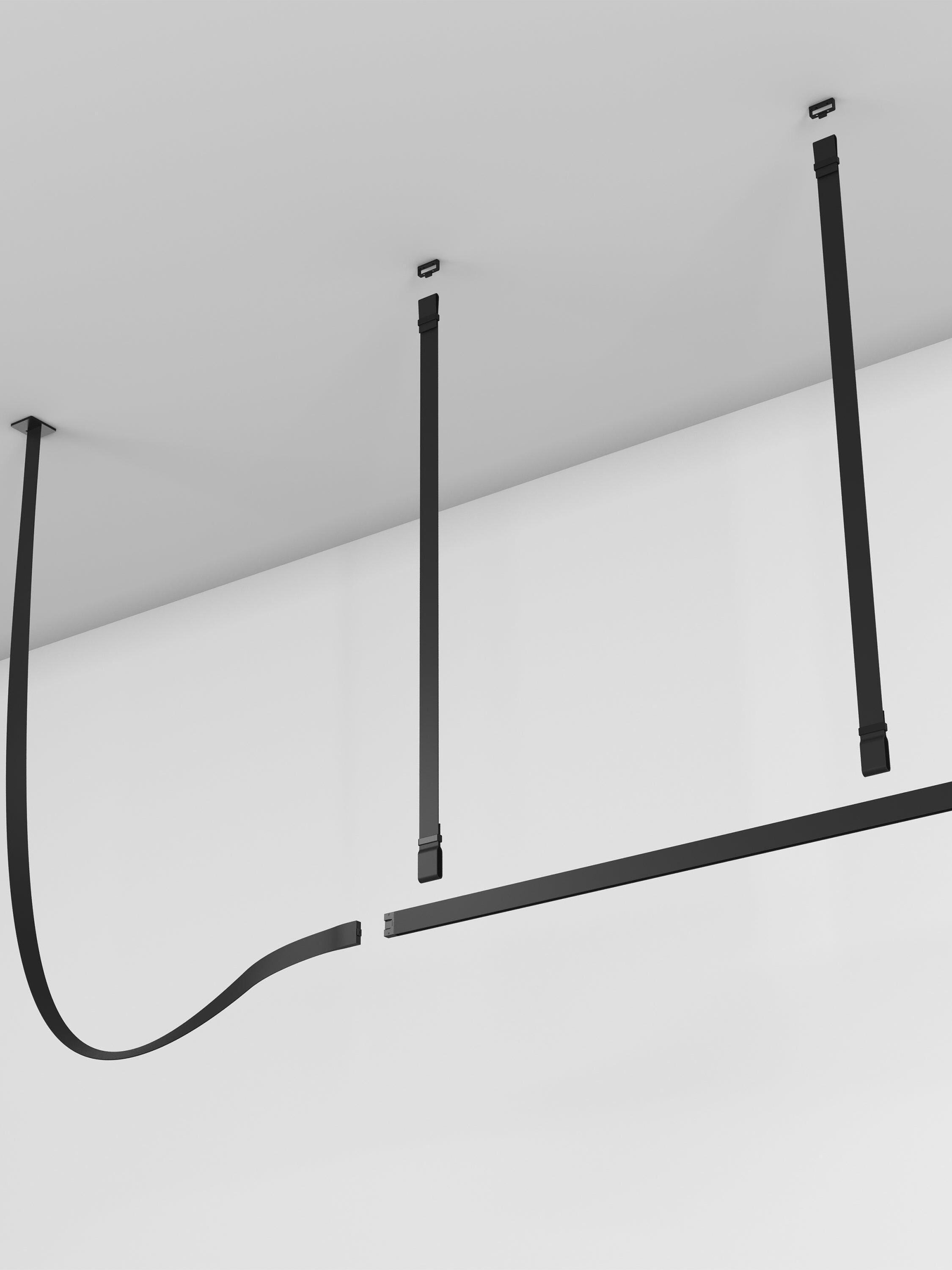 Exploded view of black bar sections, hanging straps and ceiling fastening pieces with separated connection ends