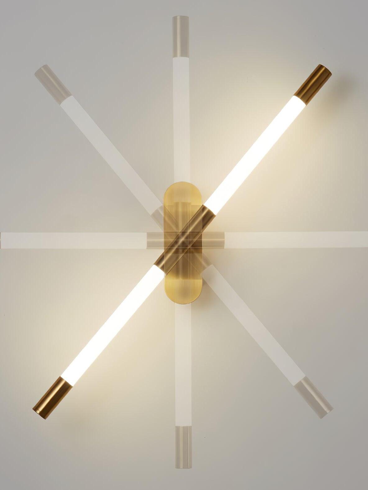 Gold Agnes wall light with overlaid vertical, horizontal and diagonal positions illustrating movement