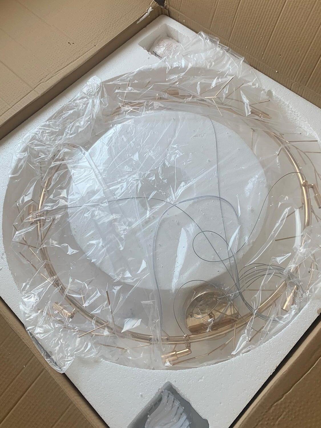 Gingko O frame and suspension cables inside foam packaging