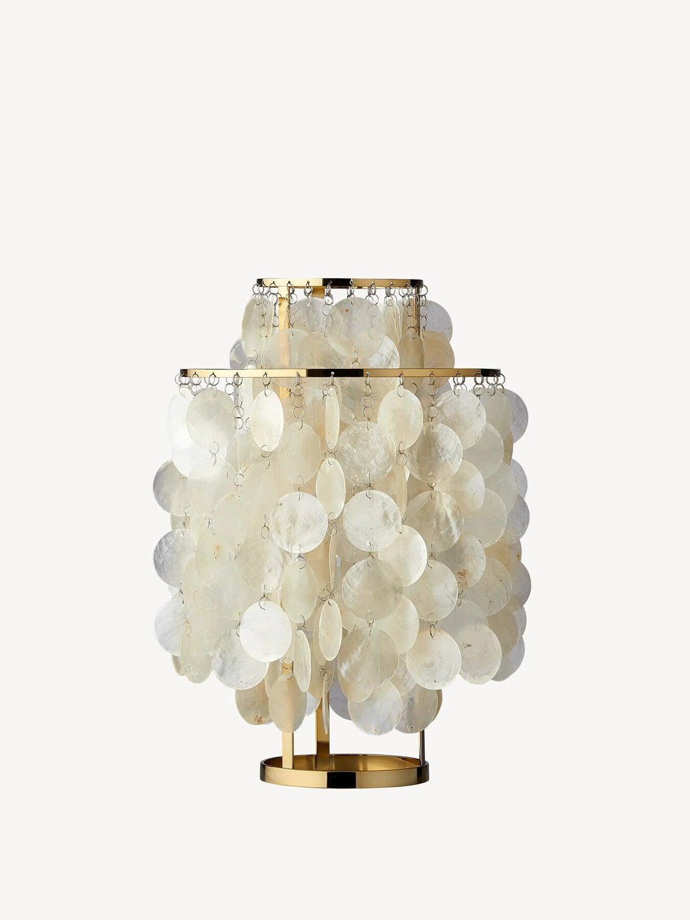 Gold-tone round-base table lamp with white shell discs