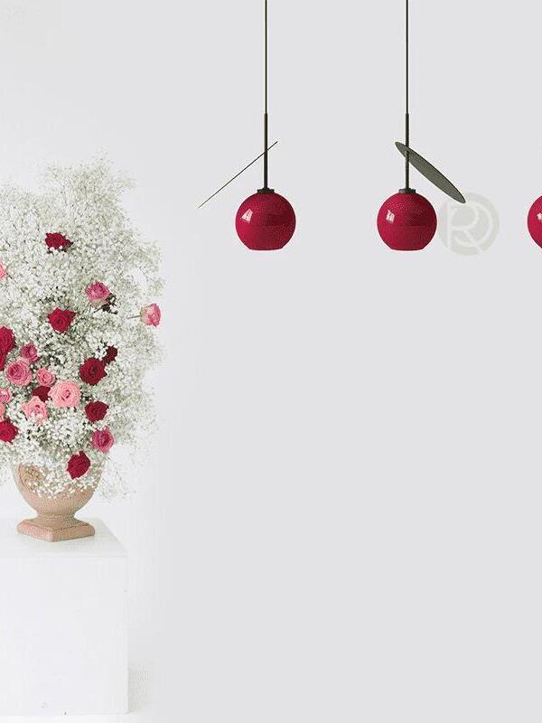 Cherry-inspired pendant arrangement beside flowers