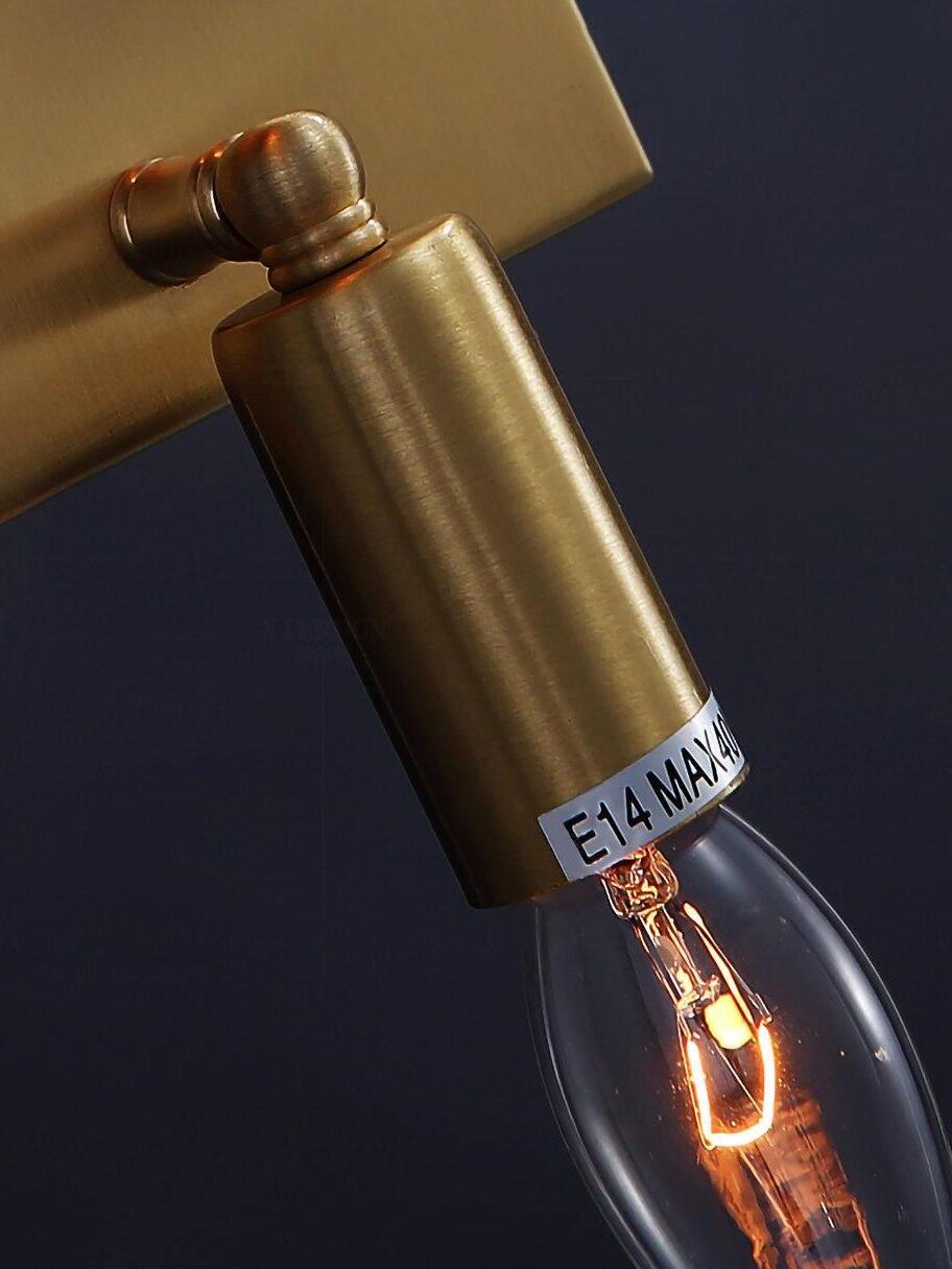 Close E14 lamp holder and bulb with partly cropped wattage label