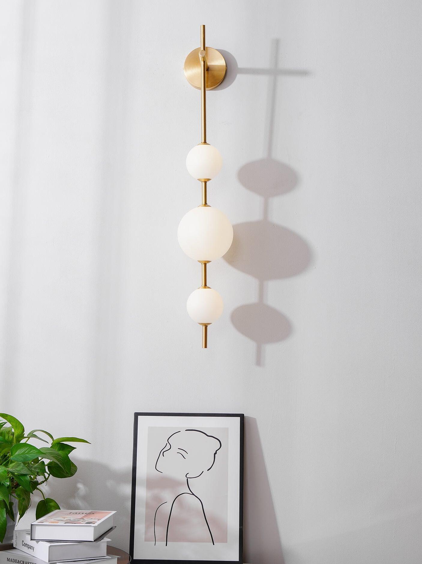 Delicate Glass Globe Vertical Brass Wall Lamp - Cueteks