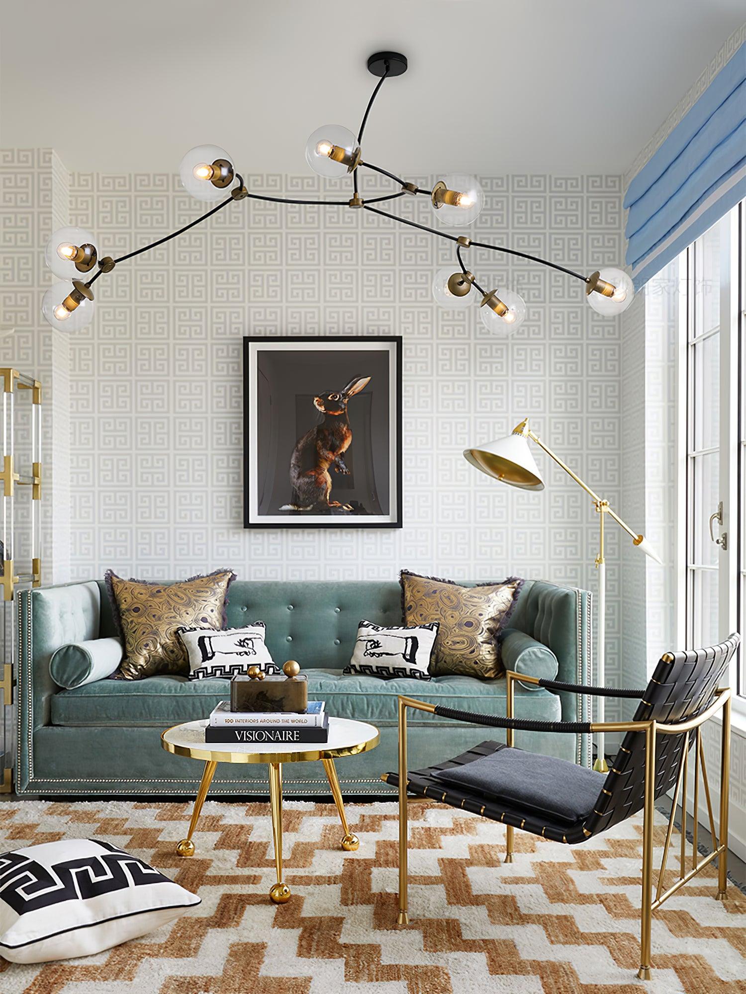 Wide clear-globe chandelier in a bright living room