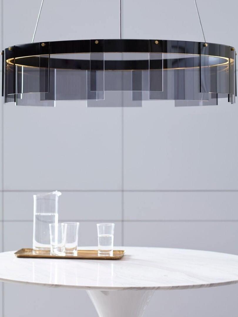 Stratos glass ring above a table and water jug