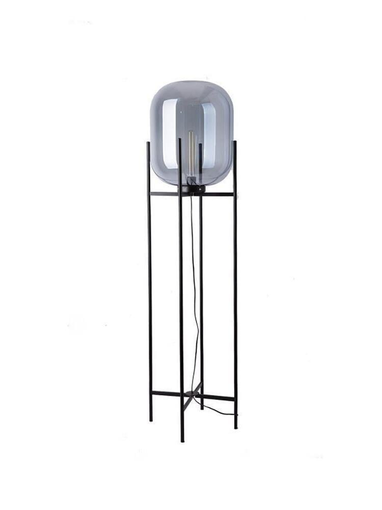 Light blue Oda glass shade supported by a slender black floor frame.