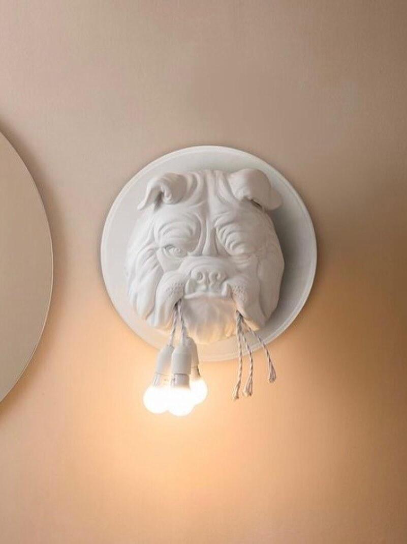 White bulldog head and illuminated hanging bulbs