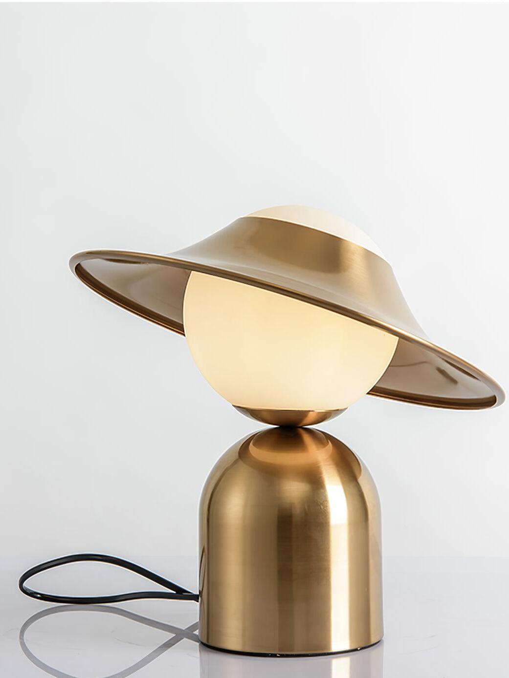 Lit globe lamp with visible black cord