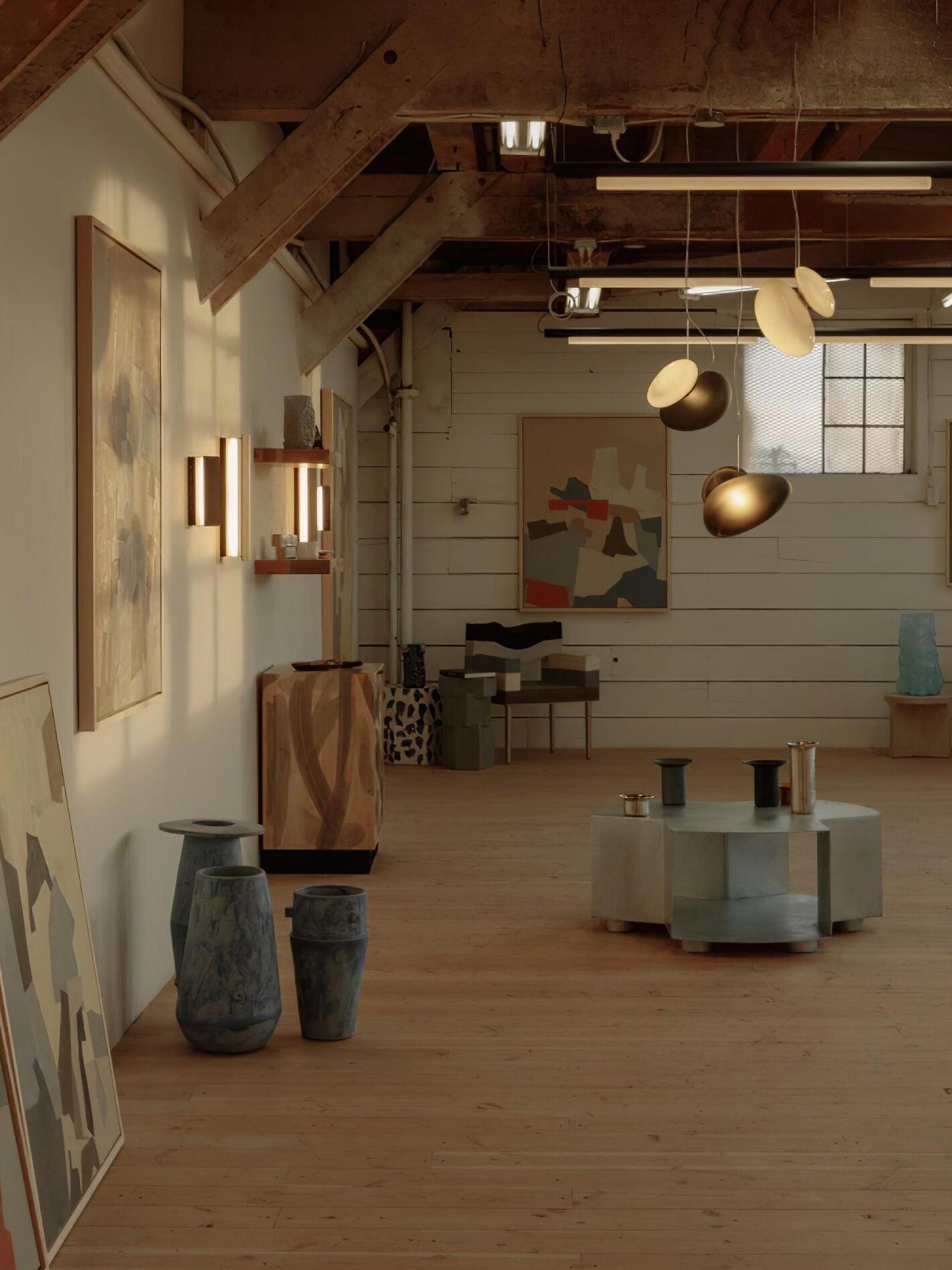 Pebble pendants hanging in a high-ceiling interior