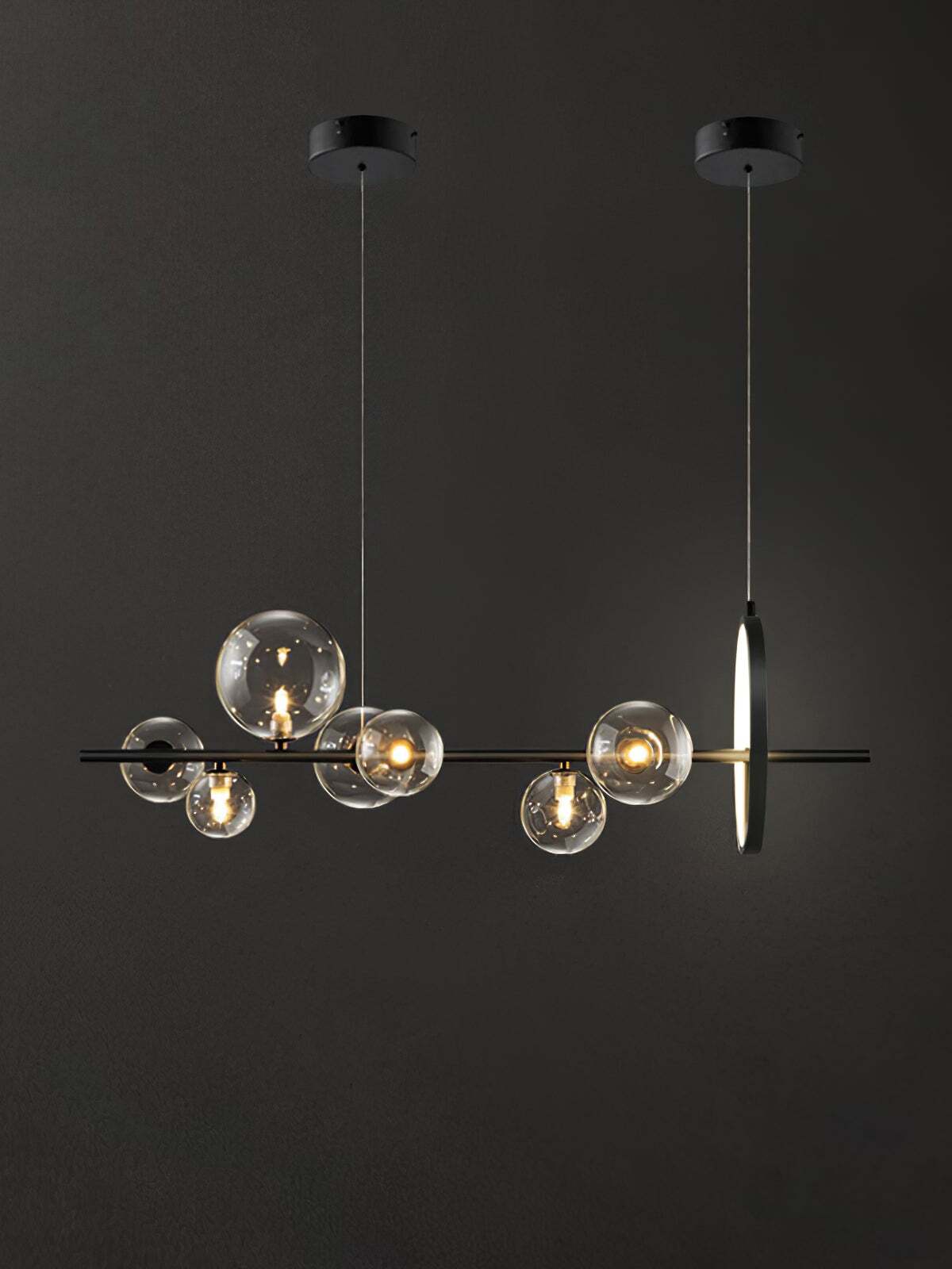 Short black chandelier with clear glass globes, an upright LED ring and two round canopies