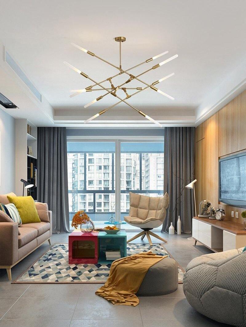 Wide Gold branch fixture in a bright family room