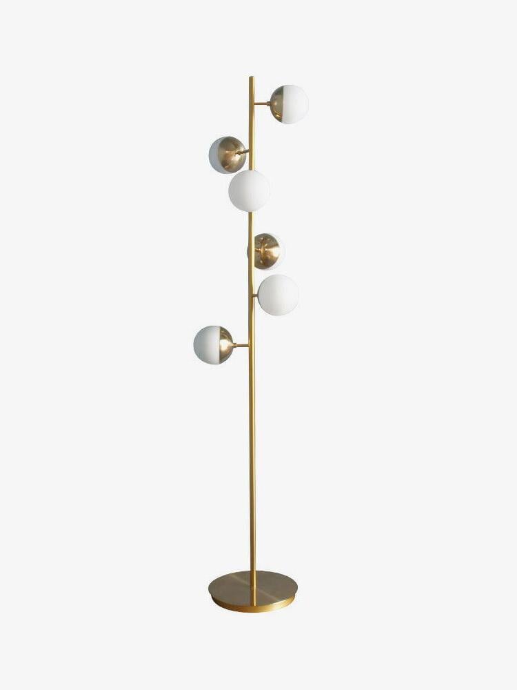 Tall gold stem with staggered white globe lights