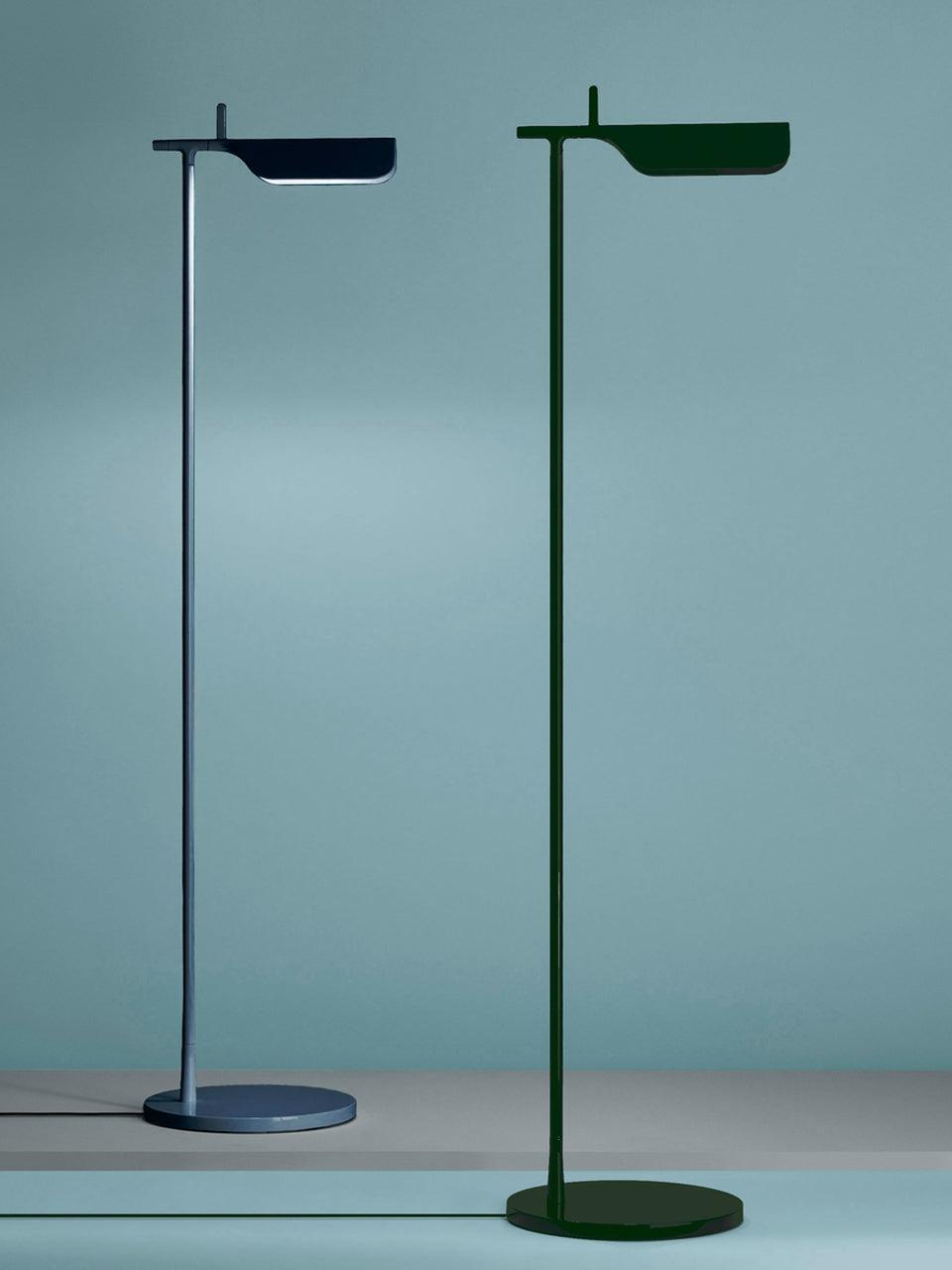 Blue and green floor lamps shown together