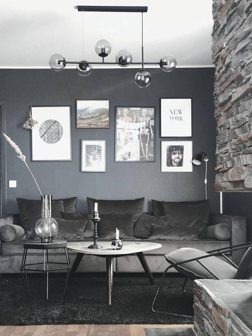 Black globe chandelier with rectangular canopy in a living room