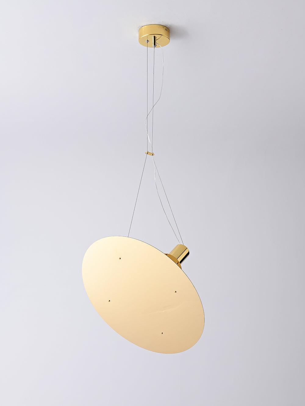 Gold Amisol pendant suspended below a round canopy