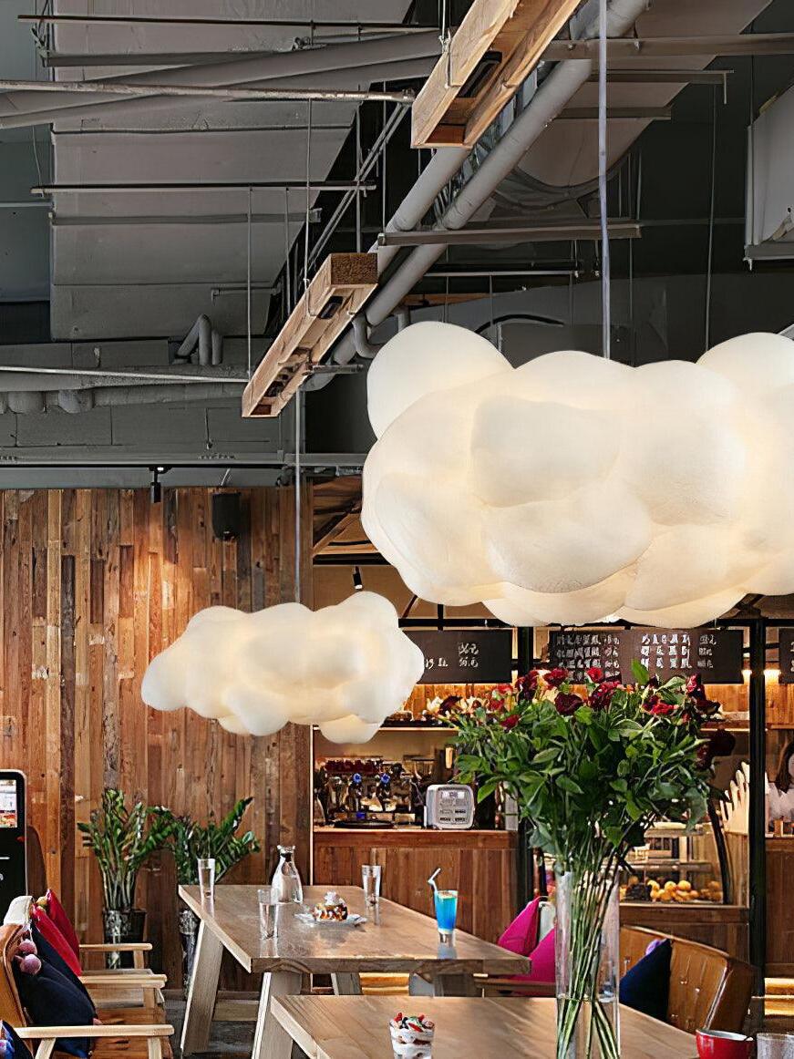 Cloud light group above indoor tables and plants