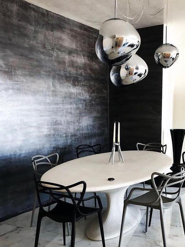 Silver reflective shades above a round table