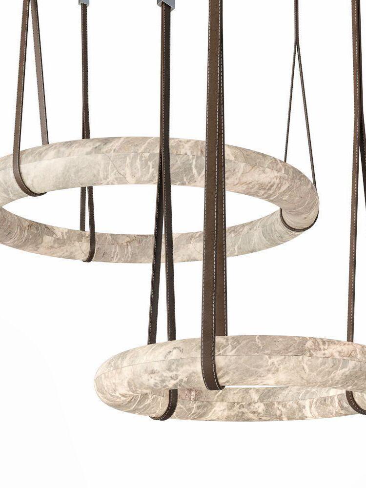 Two horizontal ring pendants on straps