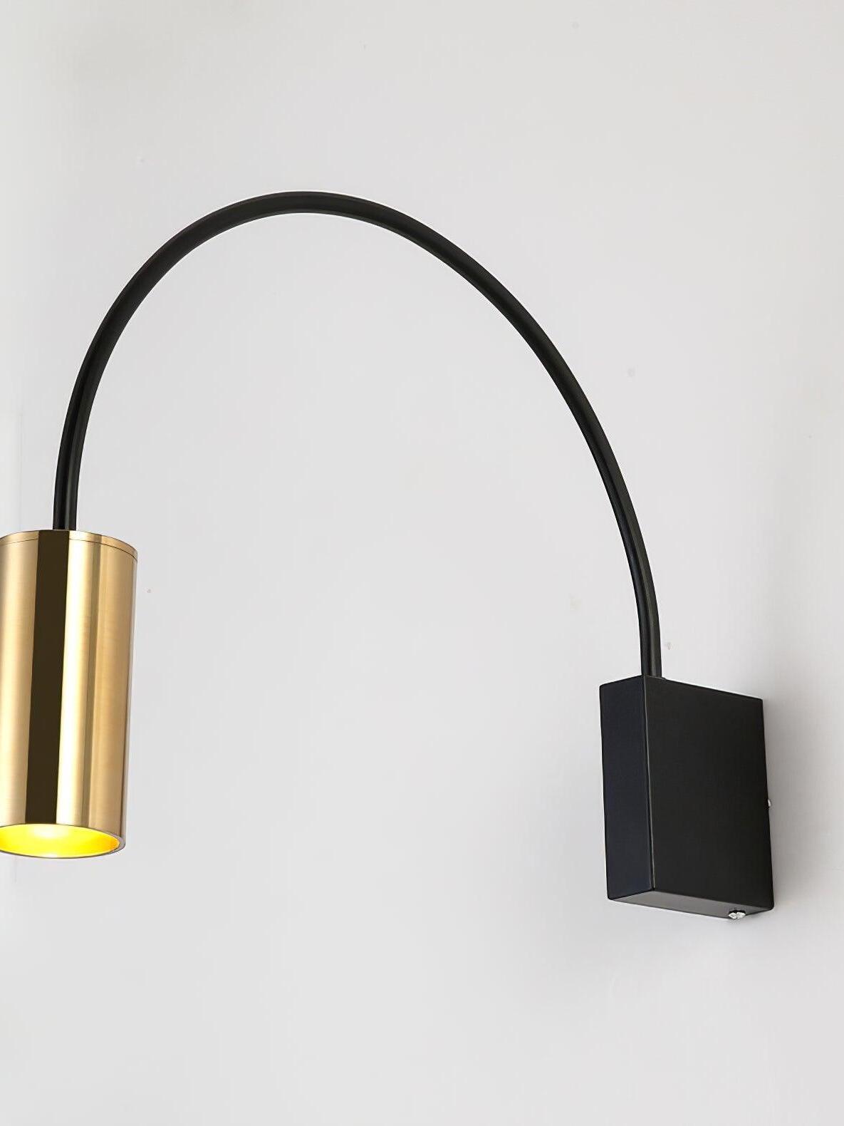 Isolated Antonella black arched arm and gold cylindrical spotlight