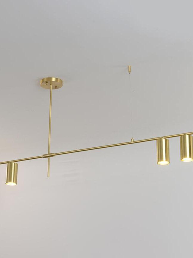 Linear gold-coloured rod chandelier viewed from below