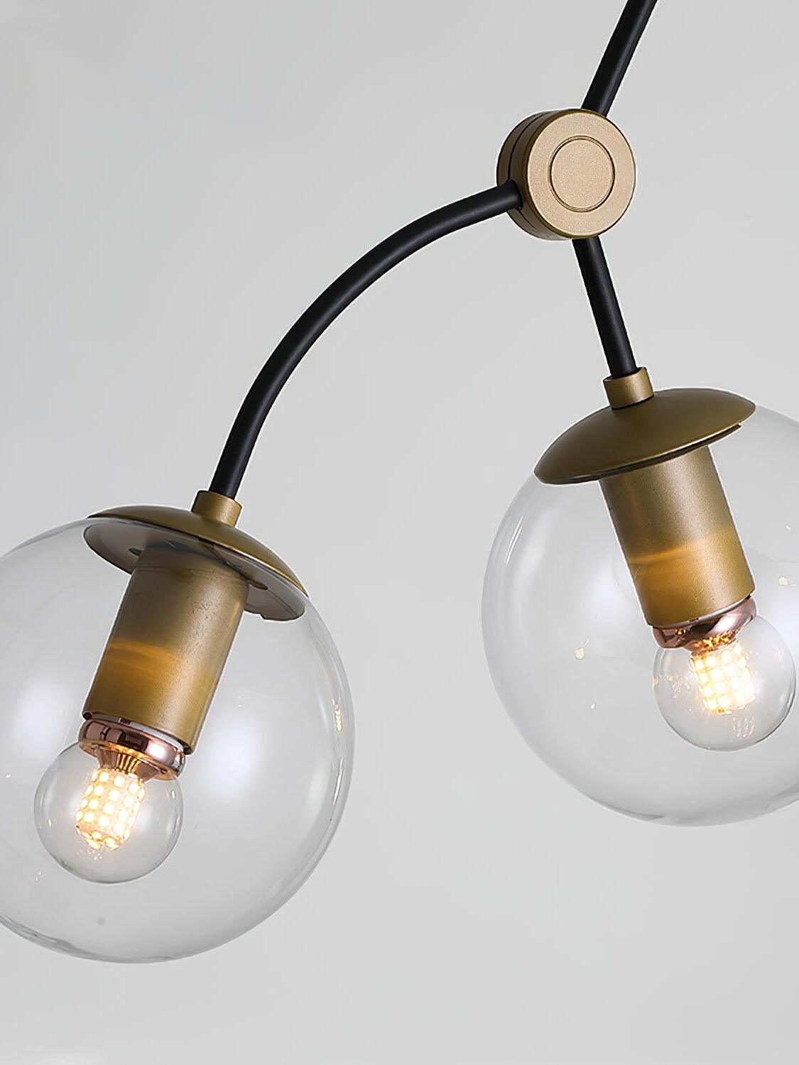 Clear globes with visible bulbs and gold-coloured caps