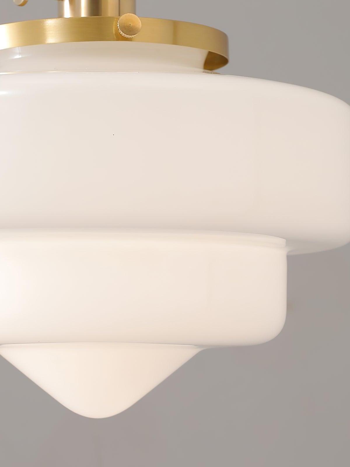 Close-up of Atlas Model A flat stepped white glass shade, pointed bottom and brass retaining rim with a thumbscrew