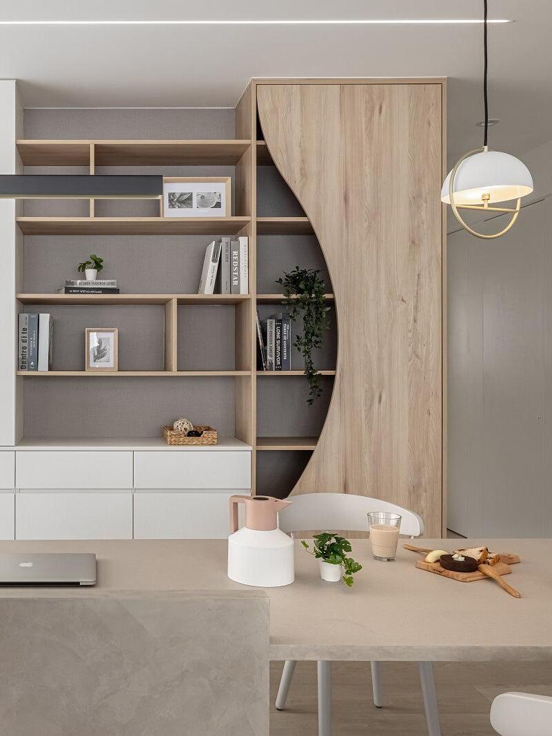 White and gold ring pendant above kitchen counter