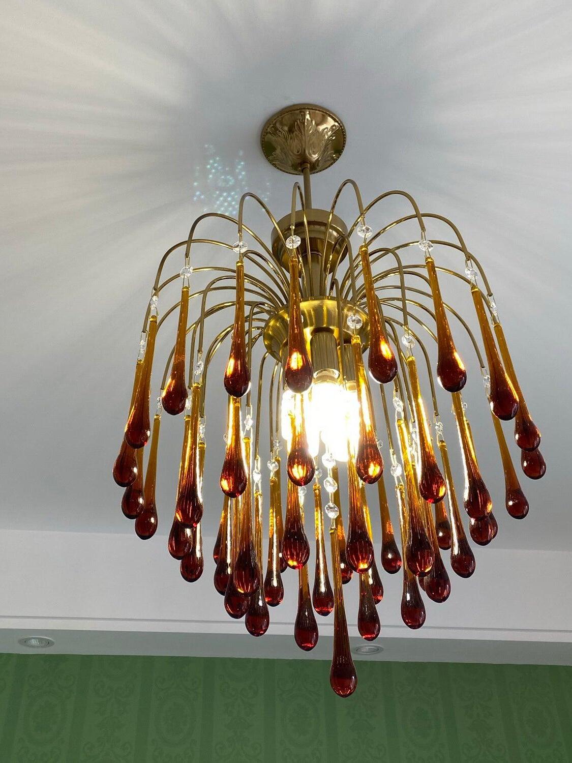 Small amber-drop chandelier viewed from below