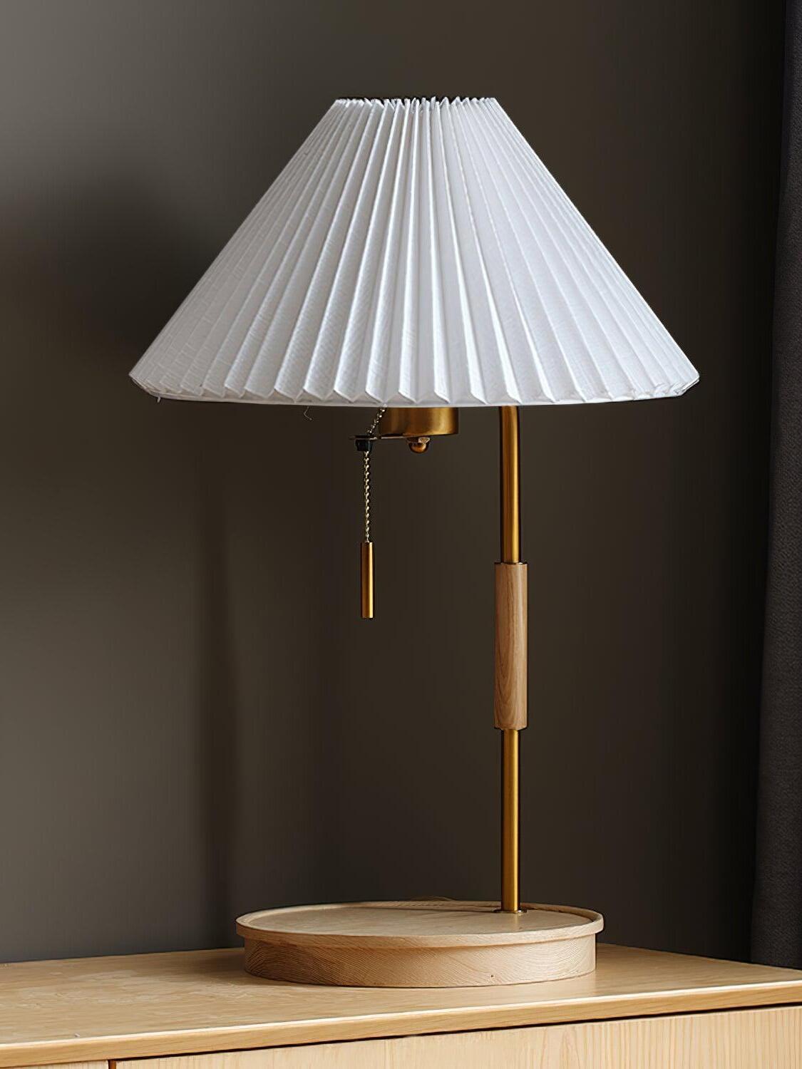 Wood color and White lamp option with a white pleated shade above a light round base and gold-tone stem