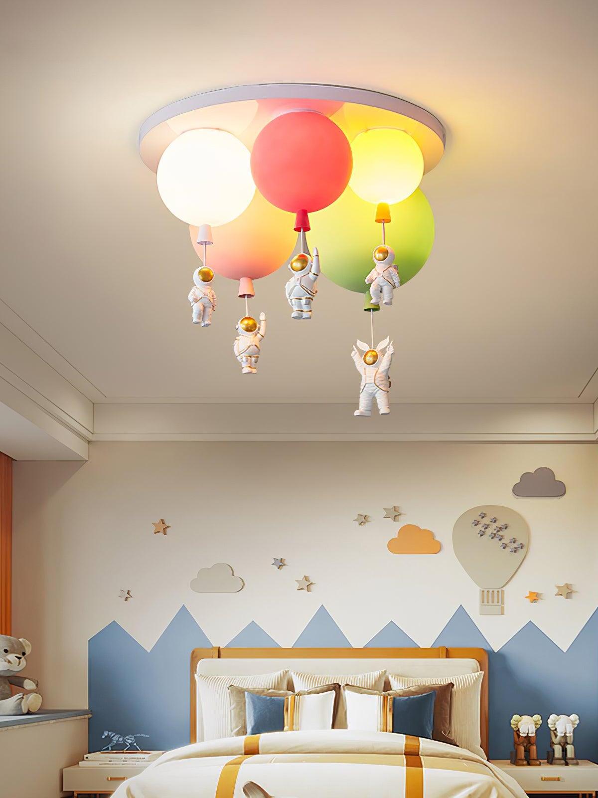 Five-balloon ceiling light in a mountain-themed bedroom