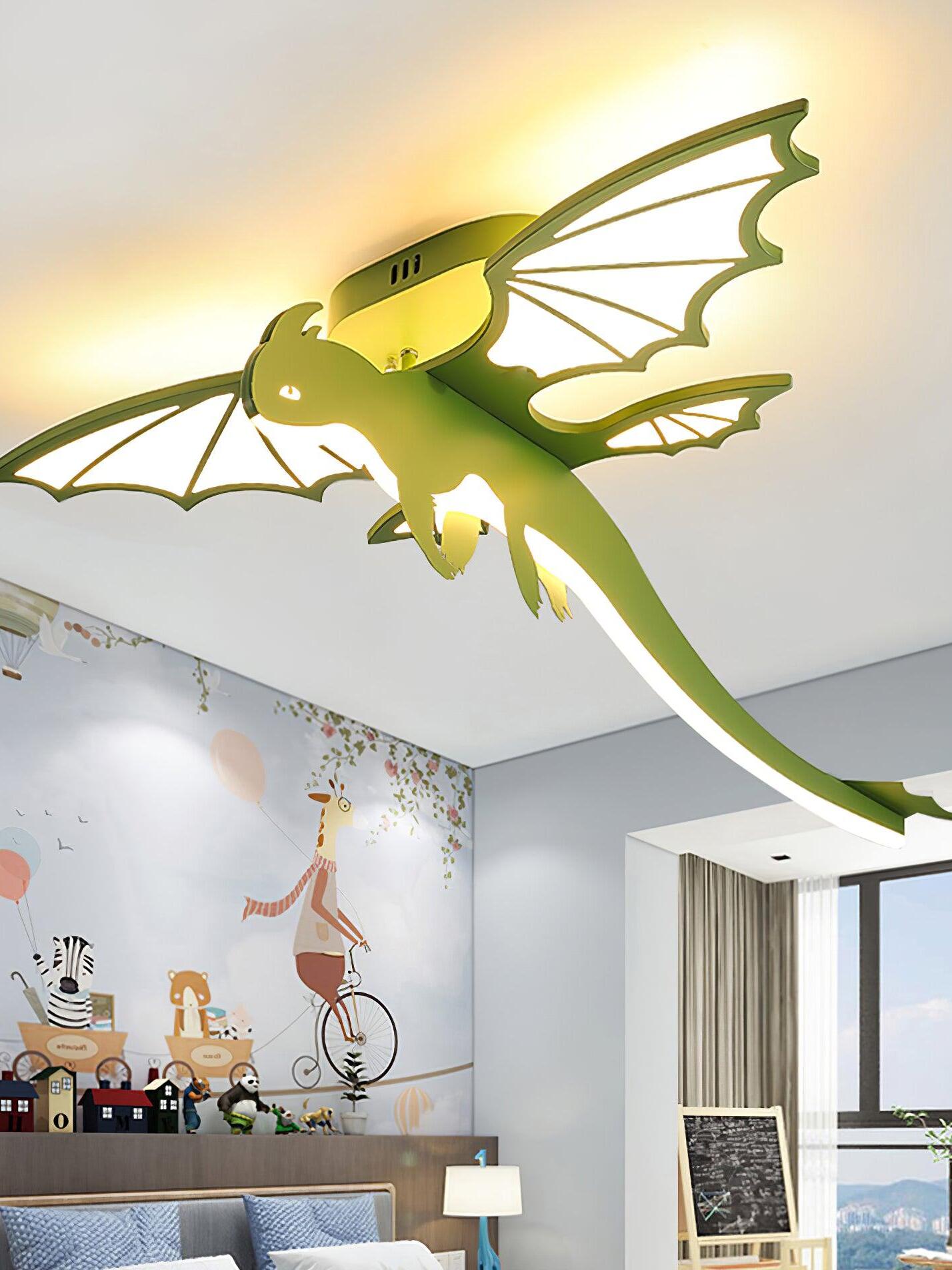 Green winged ceiling light above decorated room