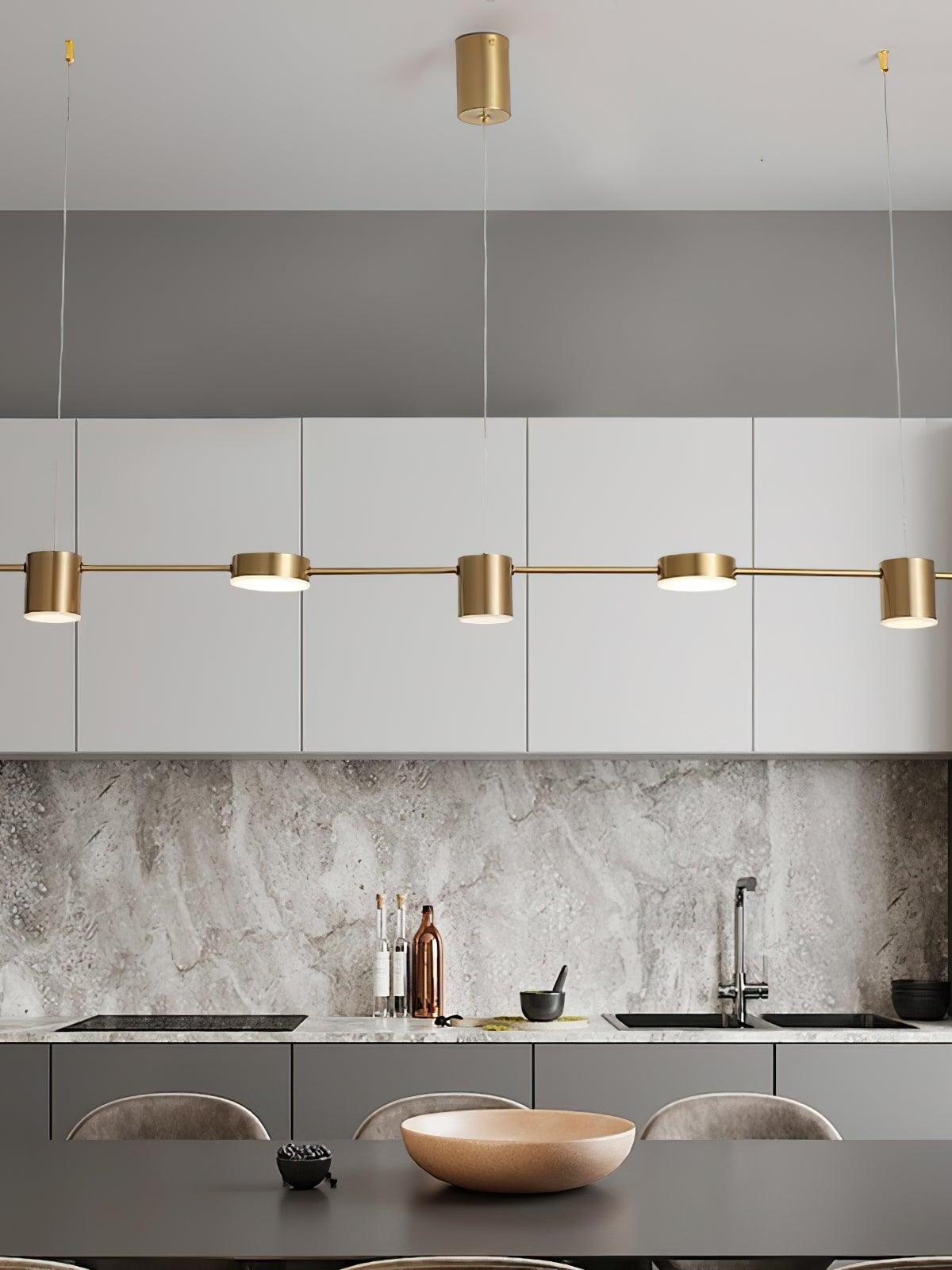 Gold linear light above a kitchen counter
