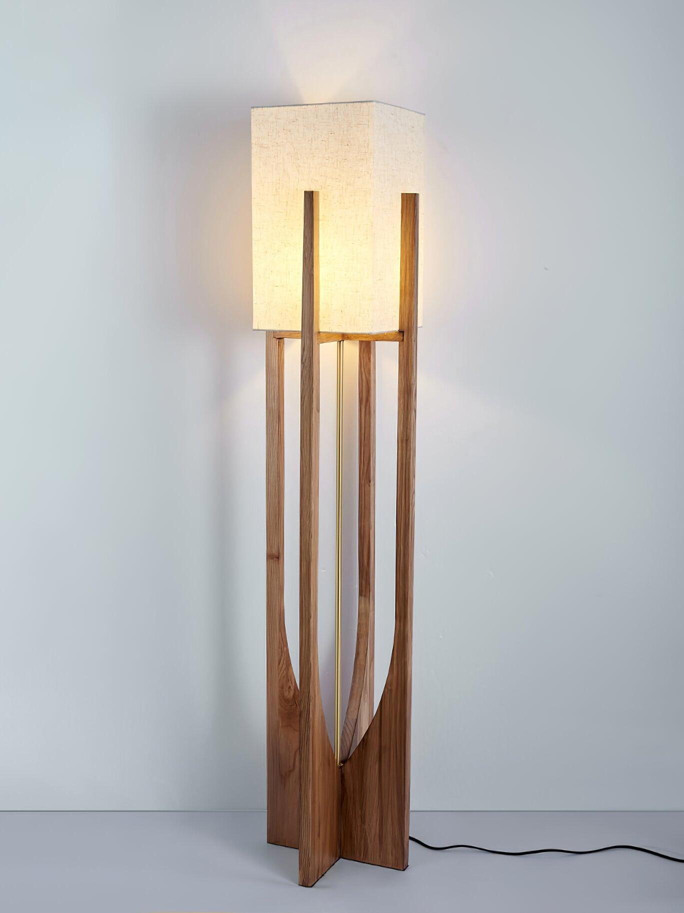 Glowing white shade on tall wood frame