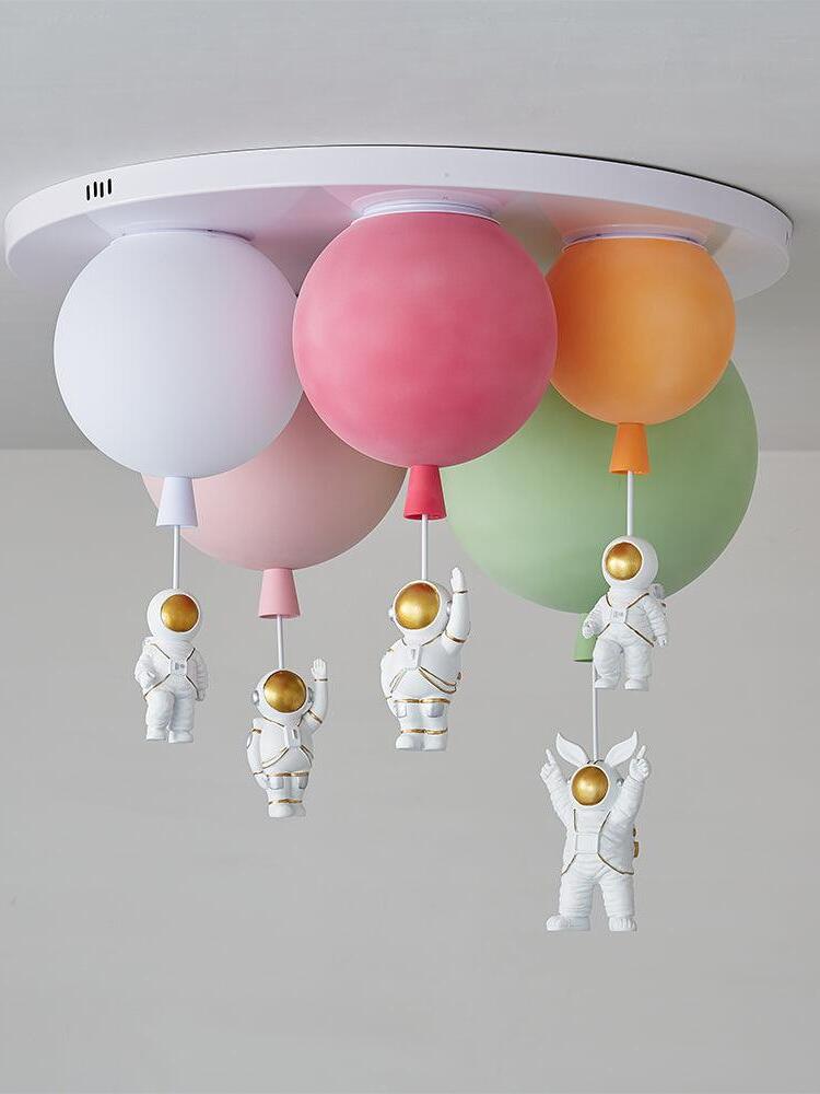 Five-balloon arrangement with white red orange pink and green shades