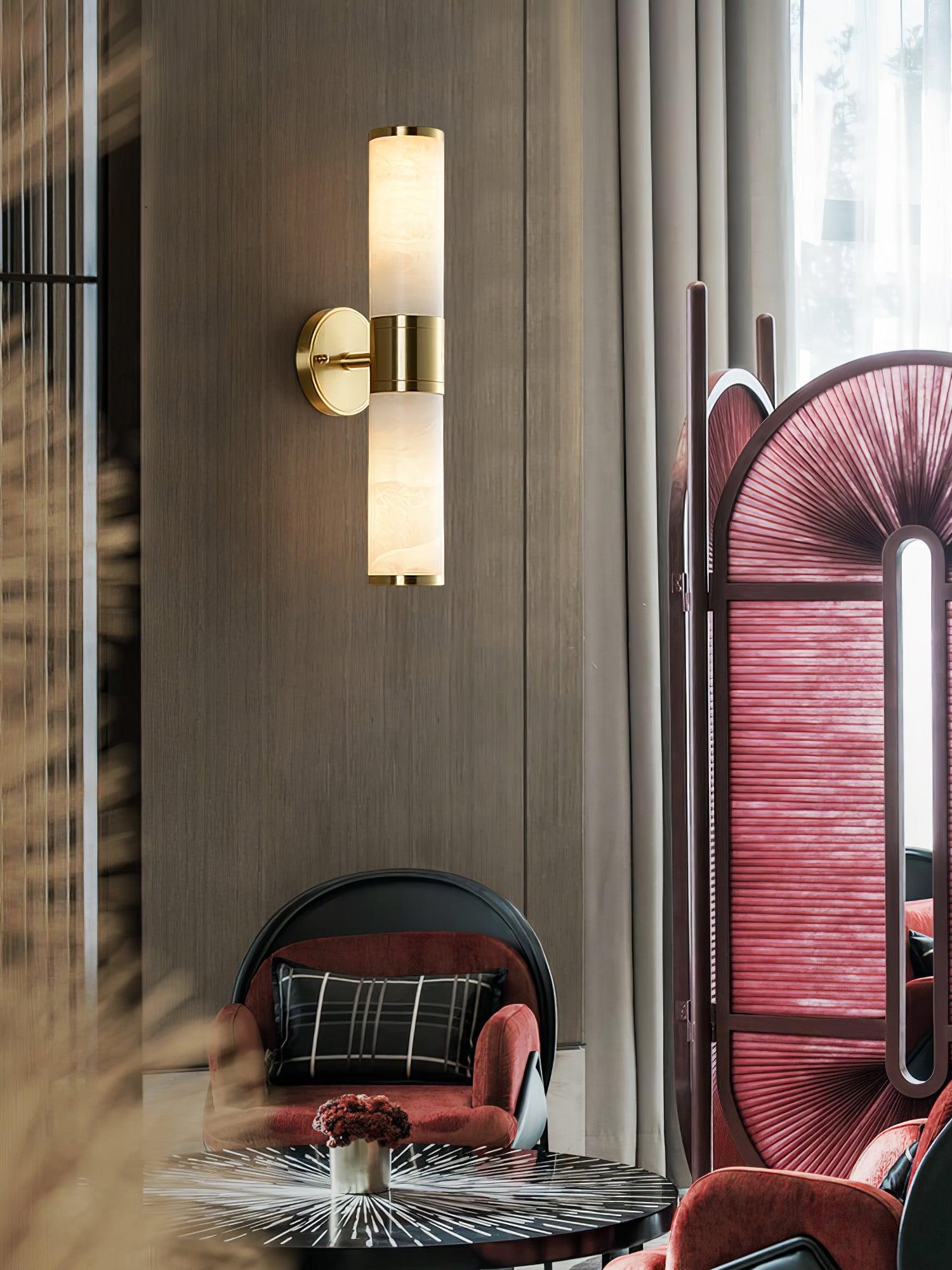 Tall stone wall sconce near window and red screen