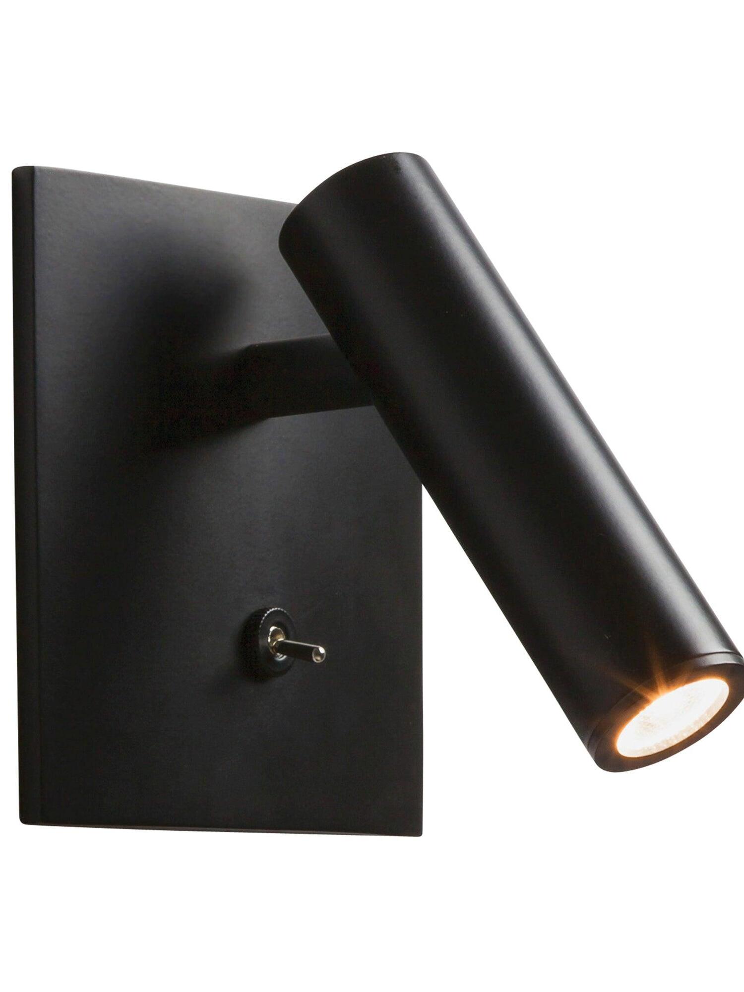 Large close view of black Enna square plate, lower toggle and angled cylindrical head illuminated against white