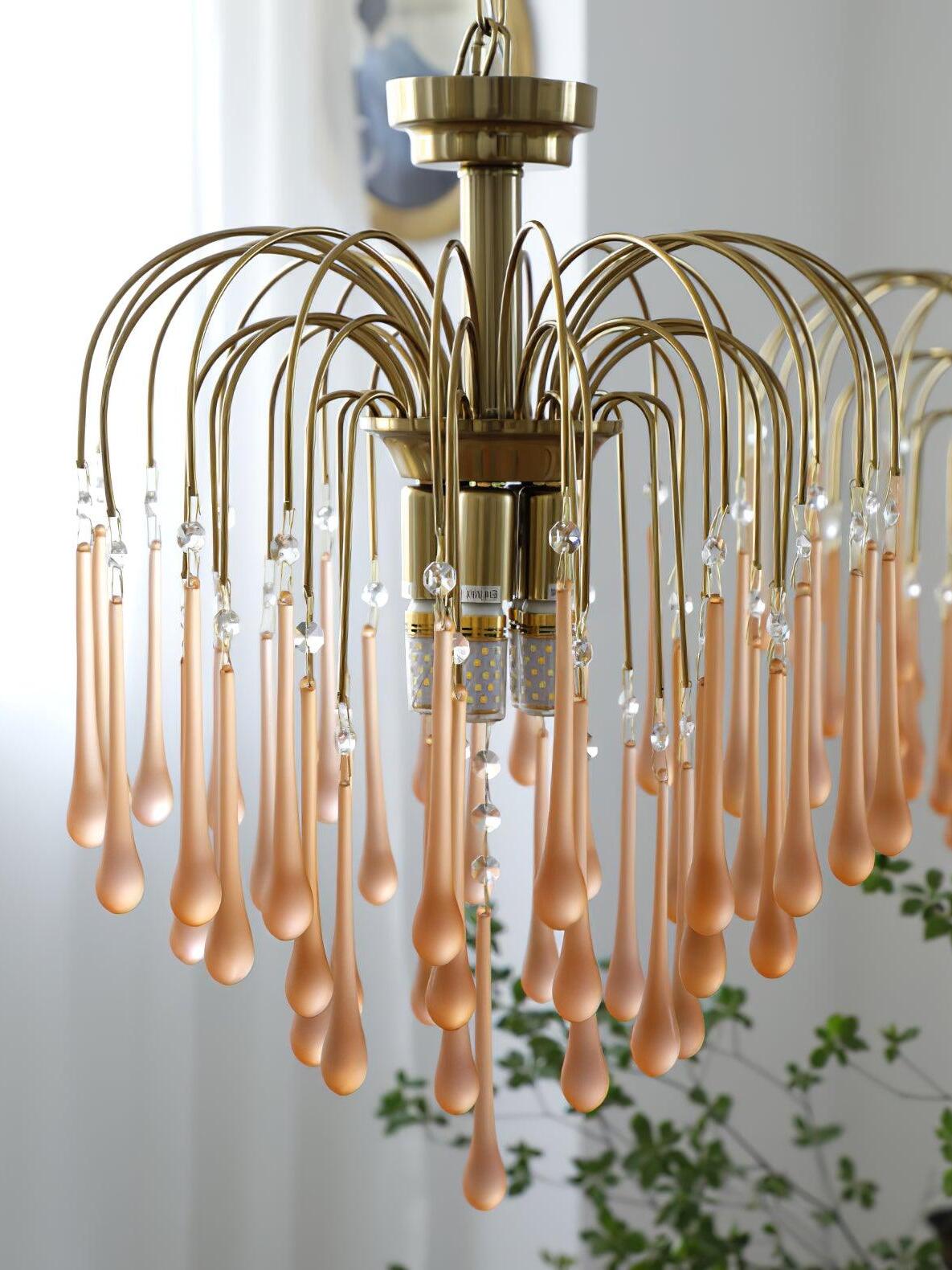 Pale peach-toned drops shown in a close view