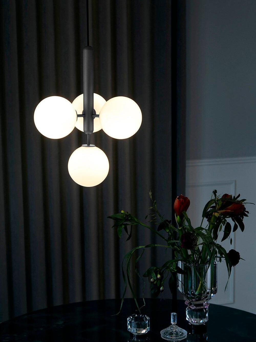 White glass cluster and black stem close view
