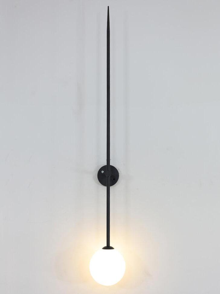 Frontal lit black rod wall light with one glowing white globe below the mounting plate