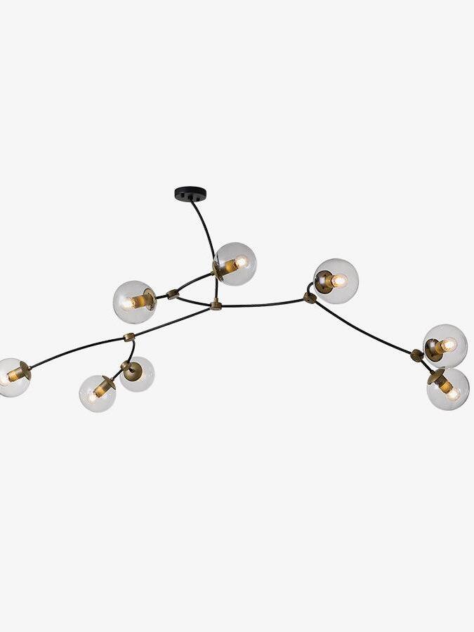 Wide black branching chandelier with clear glass globes