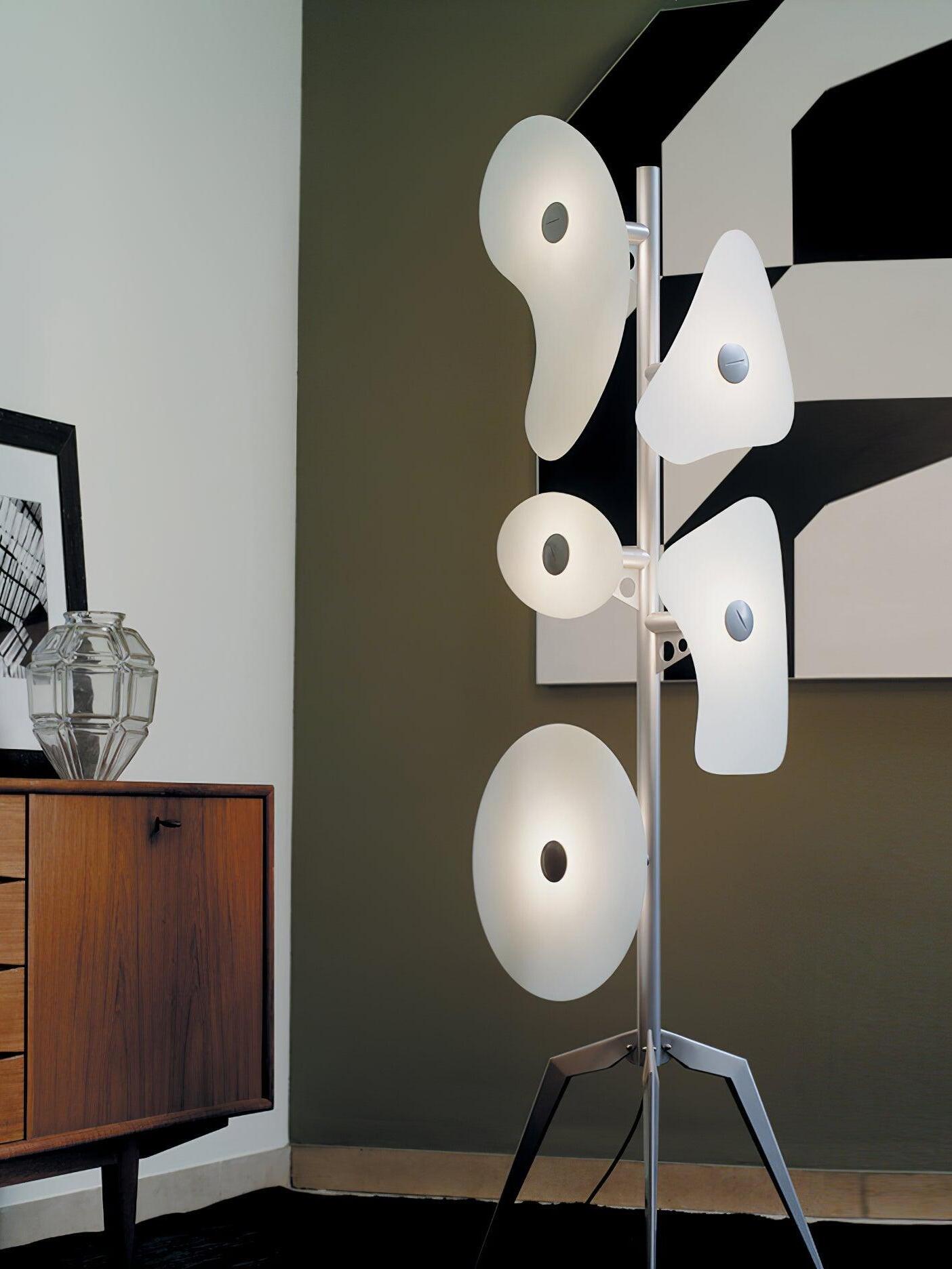 White panel floor lamp beside a cabinet