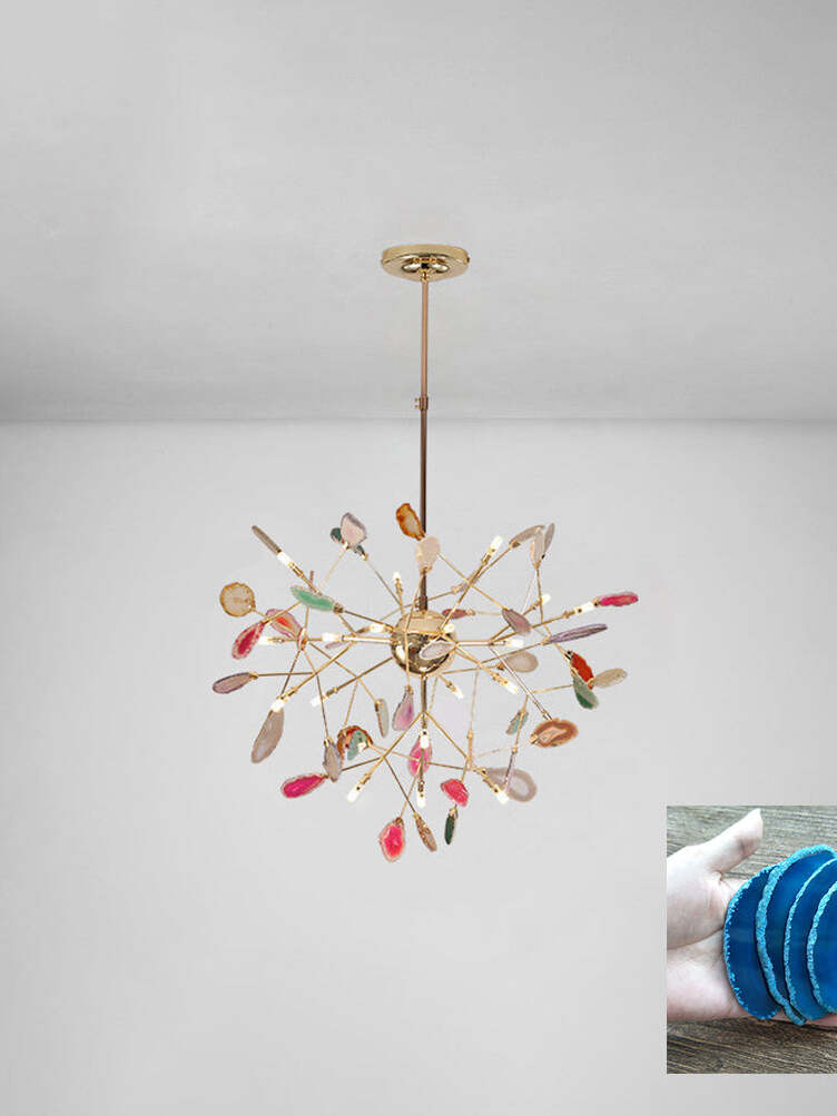 Radial multicoloured chandelier beneath a pale ceiling with a blue stone sample inset
