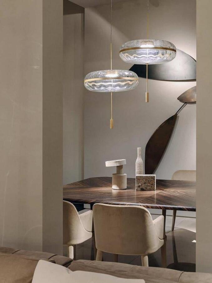 Two Jolie pendants over a dining table