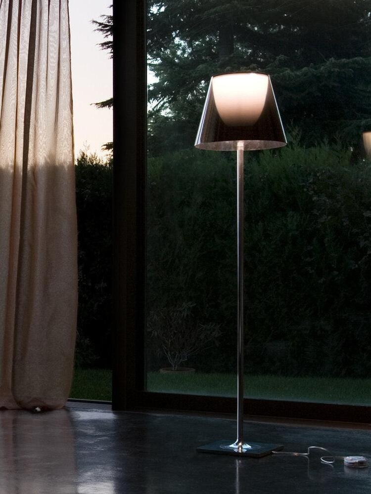 Ktribe dark translucent shade beside a window