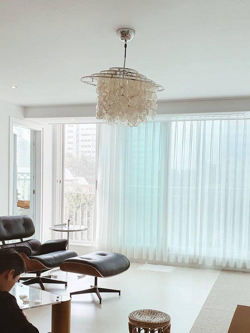 Shell chandelier in a bright lounge