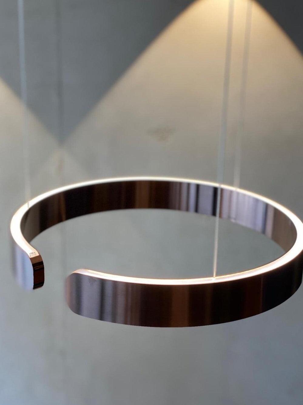 Open metallic ring viewed from below