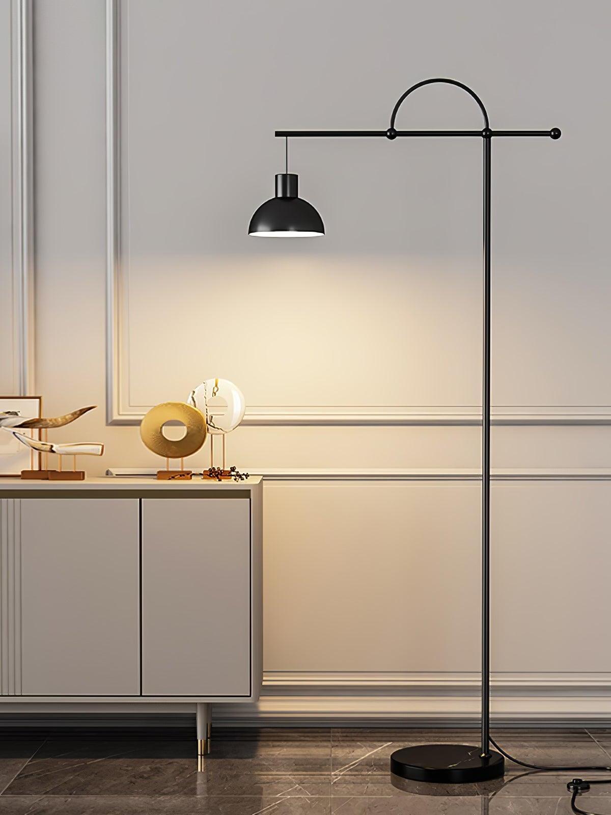 Nidal black floor lamp beside a console