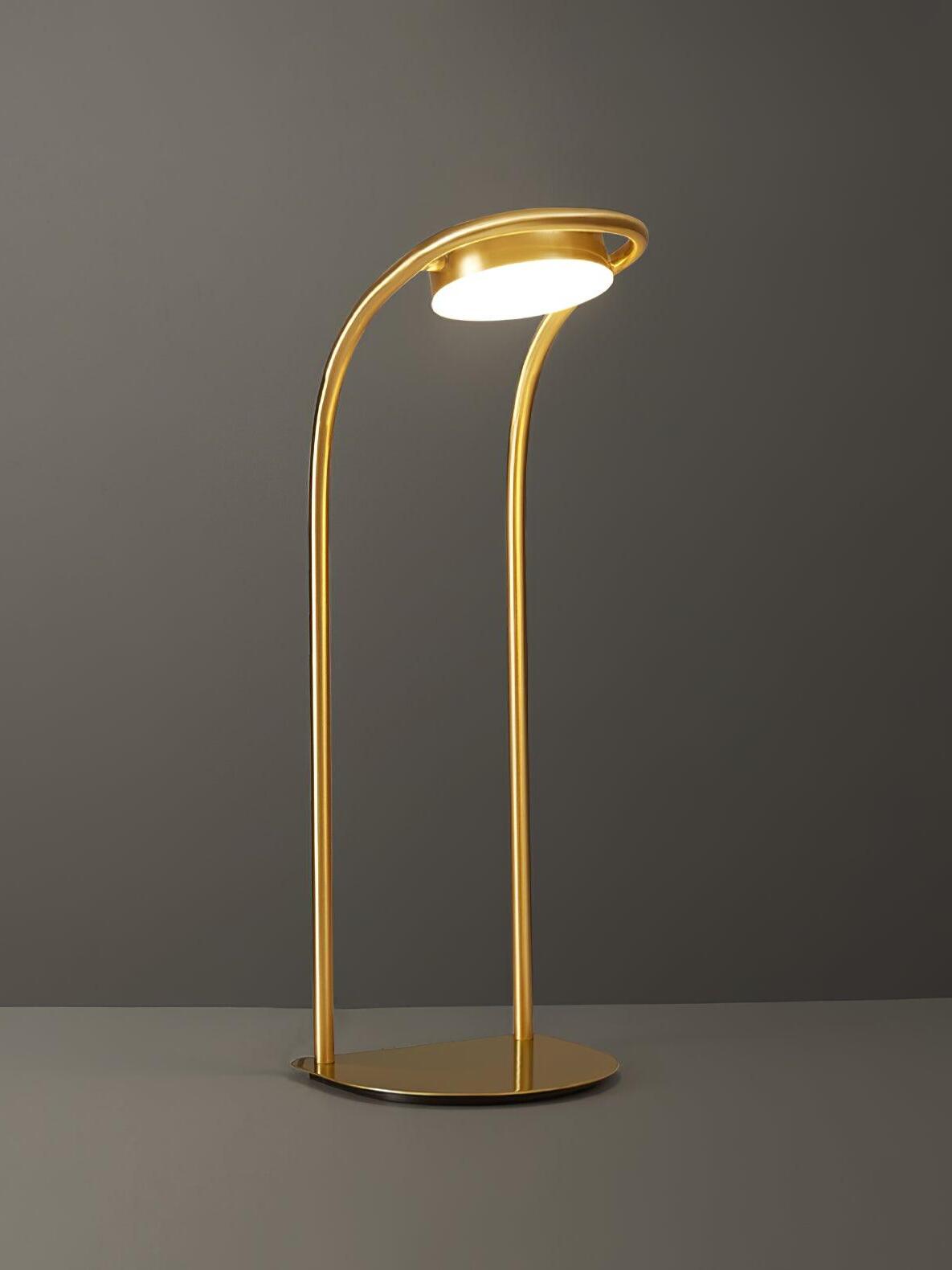 Forward-curved brass arch lamp with lit round head